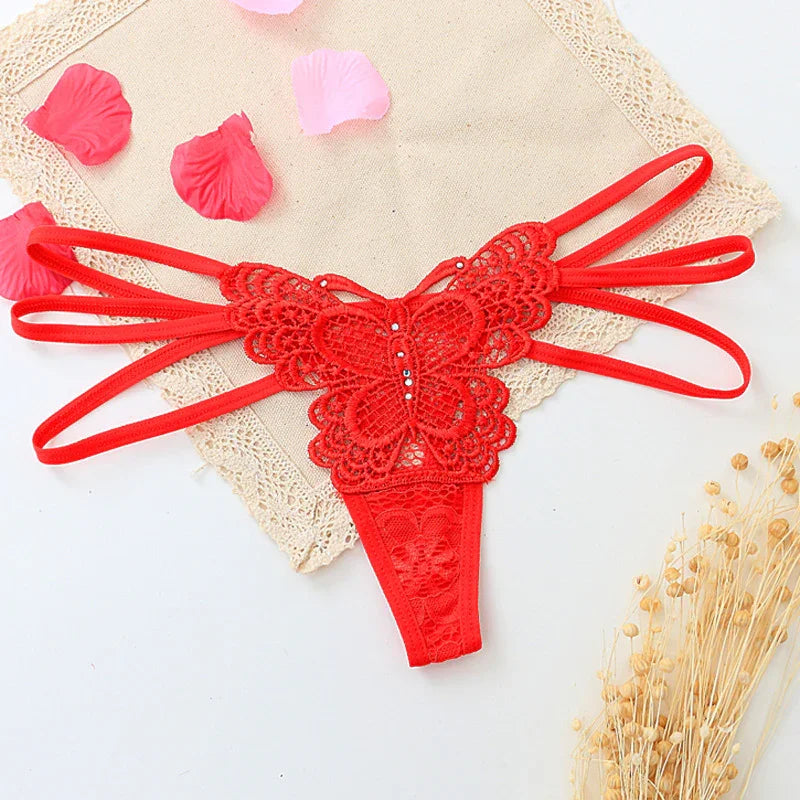 Red lace butterfly thong with strappy sides, floral embroidery, and rhinestone accents