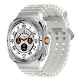 Futuristic silver smartwatch with white perforated silicone strap, digital display