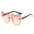Bear-shaped pink ombre sunglasses with black arms, rimless quirky streetwear style