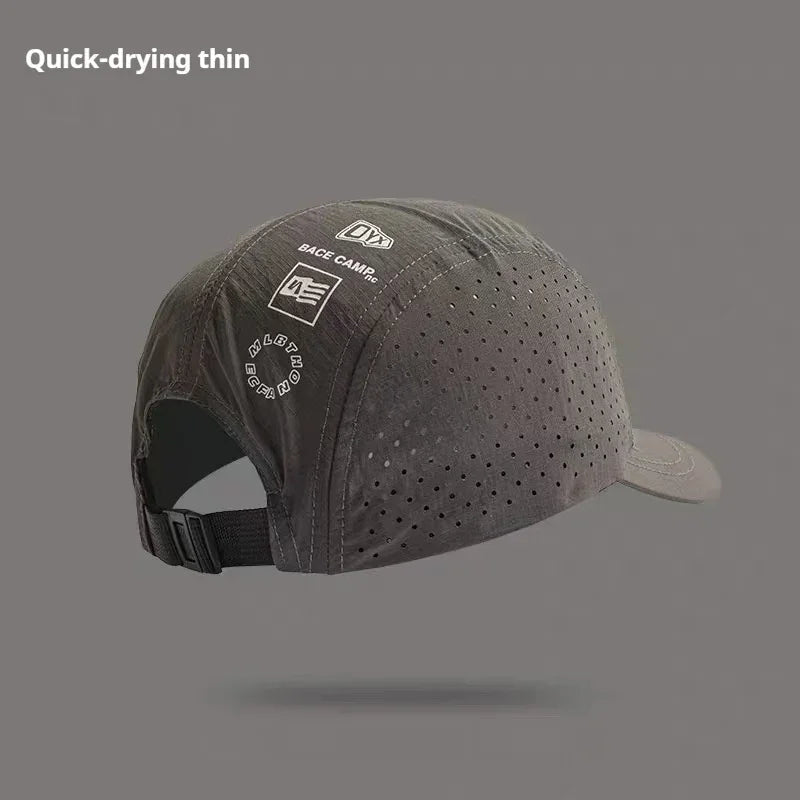 Black perforated quick-dry cap with adjustable strap and minimalist graphics