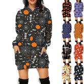 Women’s loose-fit hooded sweatshirt dress in various Halloween prints including pumpkins and skeletons, made of soft fabric.