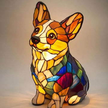 Colorful stained glass dog lamp with geometric design, illuminated in warm light