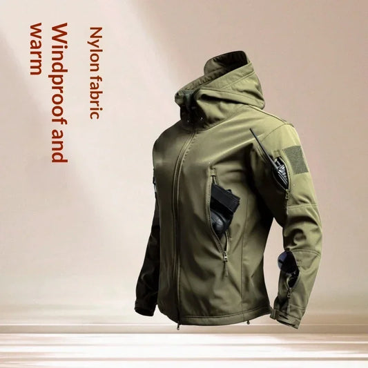 Olive green nylon windproof jacket with hood, zip pockets, and tactical streetwear style.