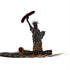 Metallic silhouette of Statue of Liberty holding a sausage, grill accessory on white background
