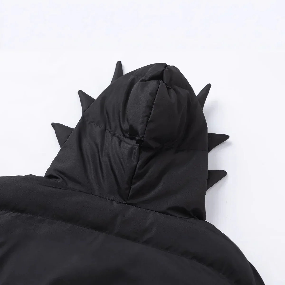 Black puffer jacket with spiked hood, futuristic streetwear style, synthetic material