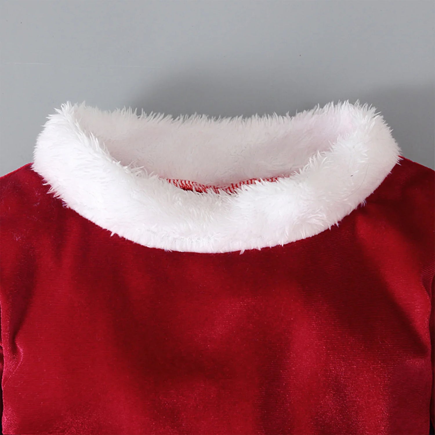 Red velvet top with soft white faux fur collar, festive winter streetwear style