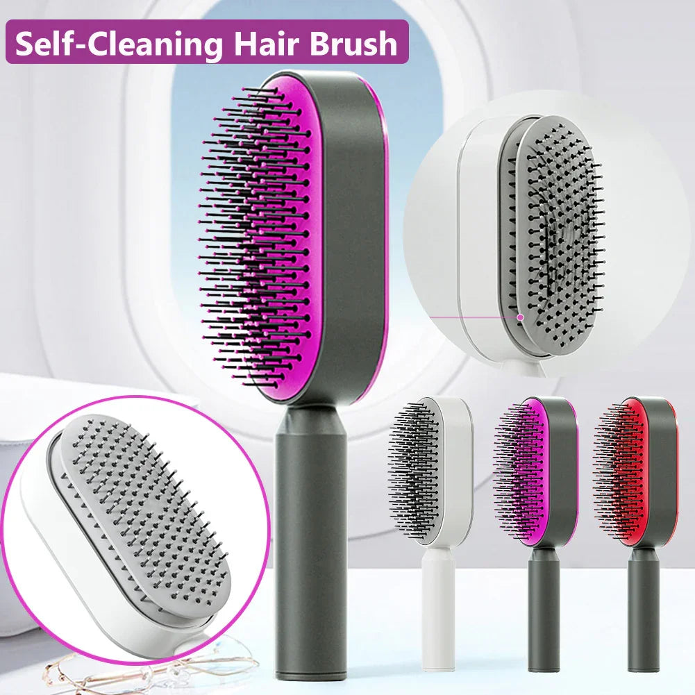 Self-cleaning hair brush in black, pink, white, and red with ergonomic handle and rectangular bristles.