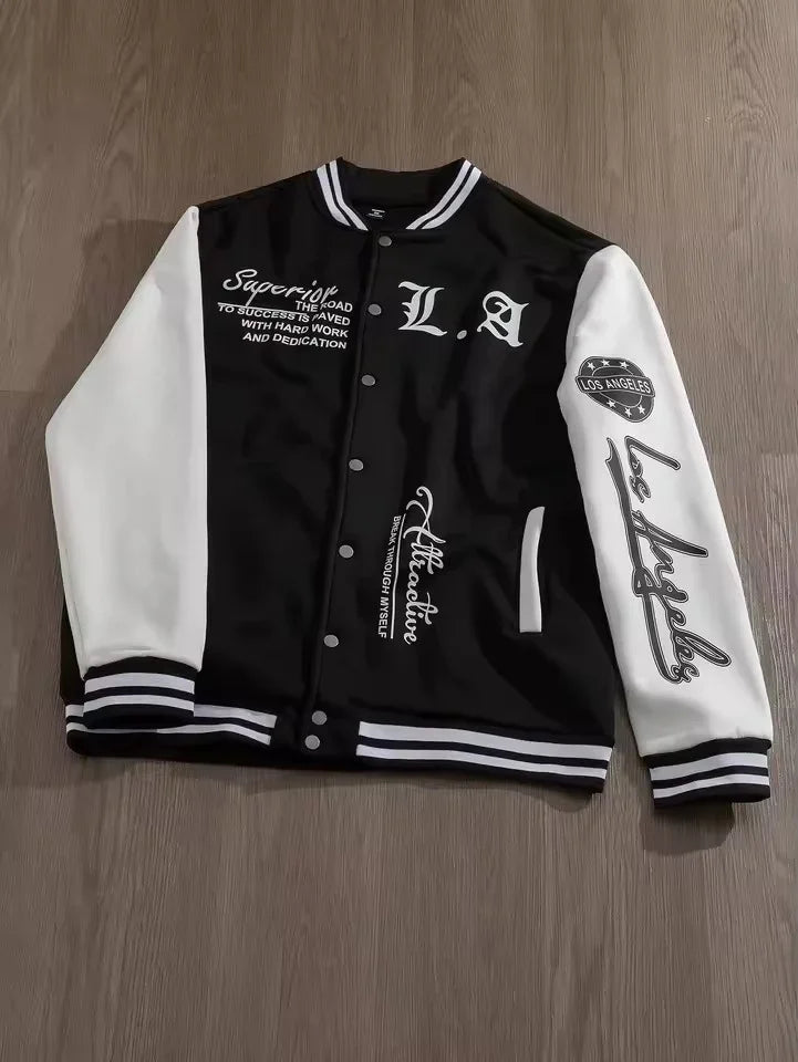 Black and white varsity jacket with embroidered text, striped cuffs, and relaxed fit.