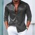Men’s slim fit long sleeve shirt in dark grey with subtle paisley pattern, paired with white pants.