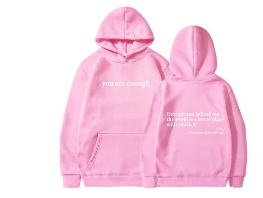 Pink cotton hoodie with front and back white text print, relaxed fit, kangaroo pocket.