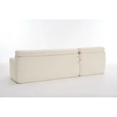Back view of a modern off-white fabric sofa with clean lines and structured cushions