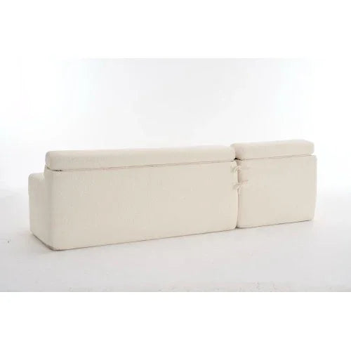 Back view of a modern off-white fabric sofa with clean lines and structured cushions