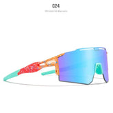 Futuristic shield sunglasses with mirrored blue lens, orange and teal frame, bold streetwear style.