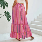 Colorful pink and yellow patterned maxi skirt, flowy fit, lightweight fabric, summer style