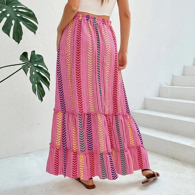 Colorful pink and yellow patterned maxi skirt, flowy fit, lightweight fabric, summer style
