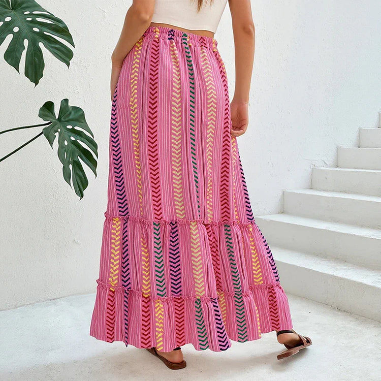 Colorful pink and yellow patterned maxi skirt, flowy fit, lightweight fabric, summer style