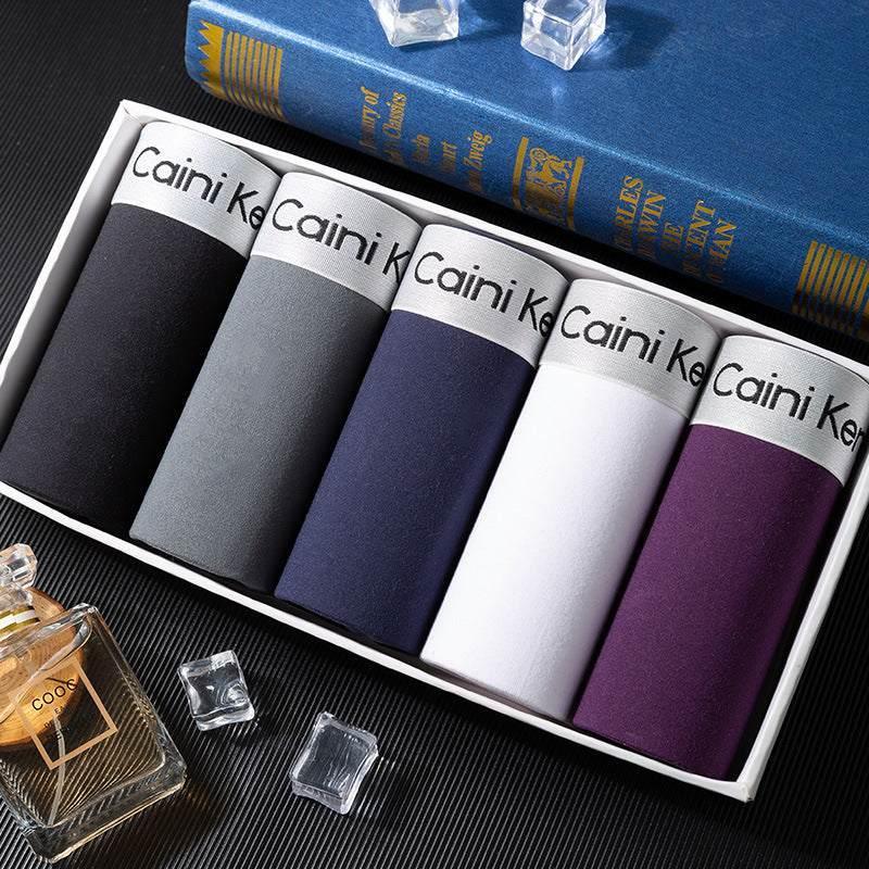 Box of men's cotton underwear in black, gray, navy, white, and purple, slim fit