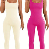 Women’s ribbed sleeveless jumpsuits in cream and hot pink, form-fitting style.