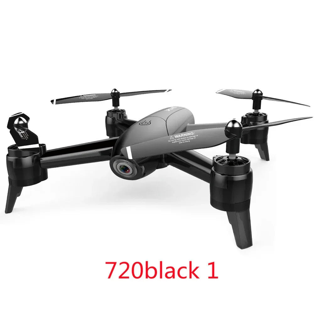Sleek black quadcopter drone with camera, matte finish, modern tech accessory on white background.