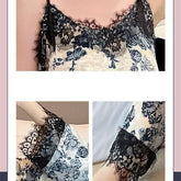 Satin slip dress with navy floral print, black lace trim, and fitted spaghetti straps.