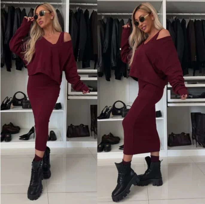 Woman wearing burgundy knit sweater and midi skirt set with relaxed fit and chunky black boots