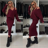 Woman wearing burgundy knit sweater and midi skirt set with relaxed fit and chunky black boots