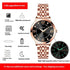 Rose gold stainless steel watch with black dial, luminous hands, and date display