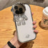 White phone case with metallic astronaut design, futuristic style, glossy and slim fit