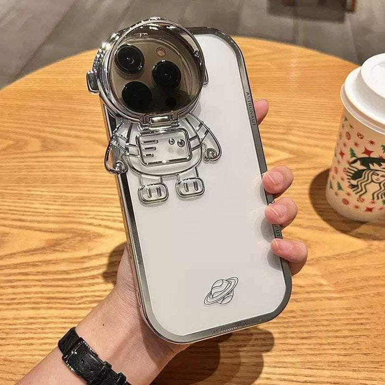 White phone case with metallic astronaut design, futuristic style, glossy and slim fit