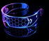 Futuristic LED visor with hexagon pattern, transparent acrylic, glowing blue and purple
