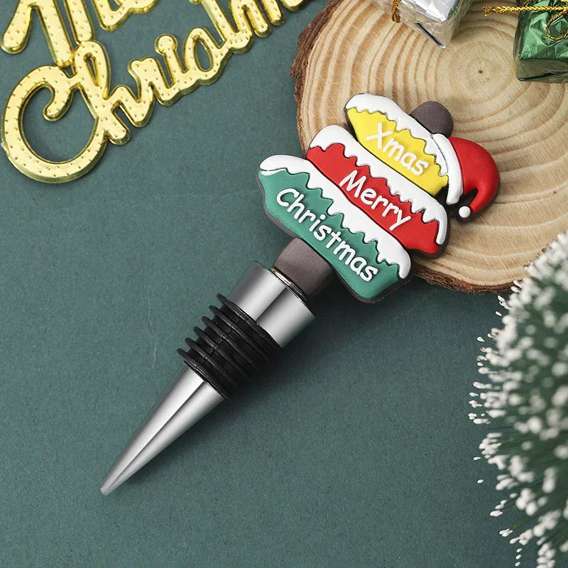 Christmas wine bottle stopper with red, green, yellow festive silicone topper and Merry Xmas text