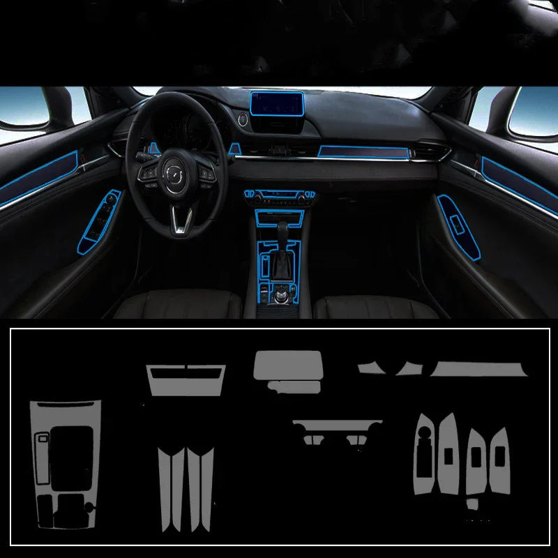 Car interior with ambient blue LED trim highlighting dashboard, doors, and center console.