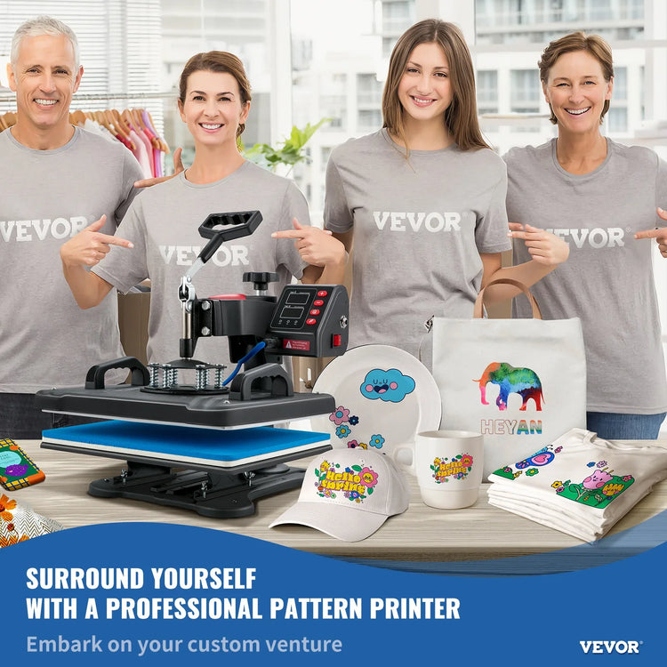 Four people in light gray crewneck t-shirts with bold white text, standing behind a table displaying custom printed cotton apparel and accessories including graphic tees, a tote bag, hats, and mugs.