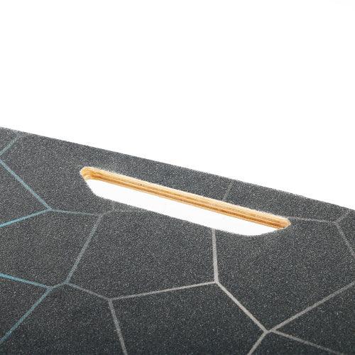 Close-up of black geometric textured surface with cutout, appears to be sturdy material