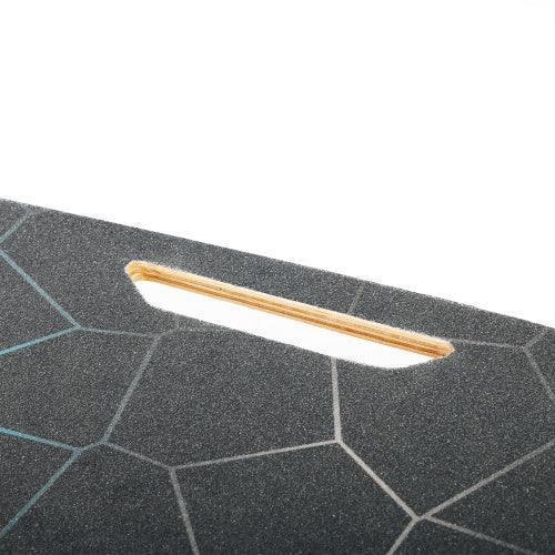 Close-up of black geometric textured surface with cutout, appears to be sturdy material