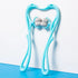 Light blue plastic handheld massage roller with textured gray wheels on a blue and white background
