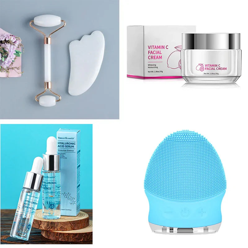 Skincare tools set with jade roller, gua sha, vitamin C cream, hyaluronic acid serum, blue facial cleansing brush