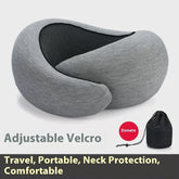 Grey ergonomic travel neck pillow with adjustable Velcro, soft fabric, and portable bag.