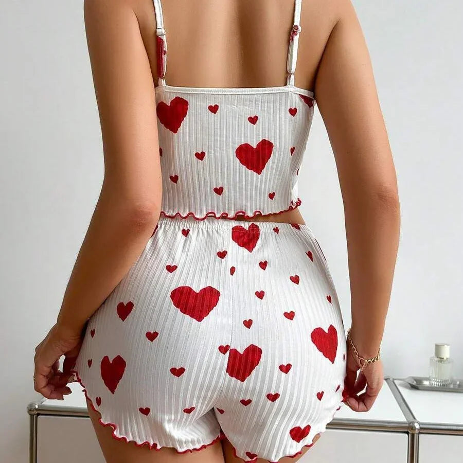 White ribbed two-piece loungewear set with red heart print, fitted crop top and shorts