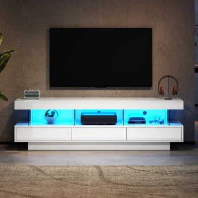 Modern white TV stand with blue LED lighting, glass shelves, and minimalist decor