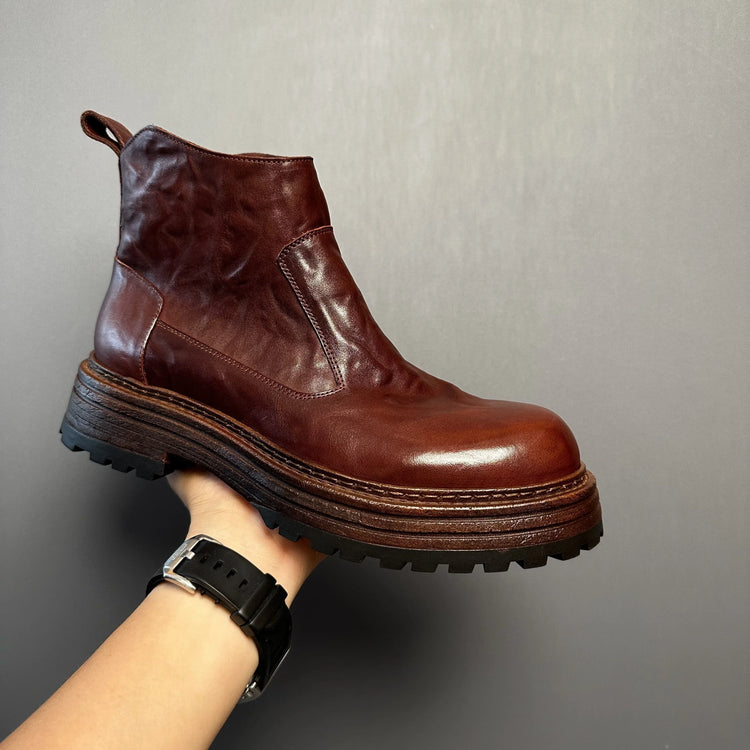 Chunky sole brown leather ankle boot with smooth finish and rugged tread, modern fit