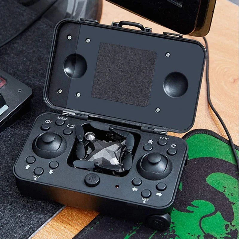 Foldable mini drone with geometric design in a compact black controller case