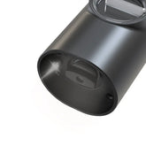 Matte black cylindrical device with transparent top and built-in camera lens, modern tech accessory