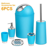 Modern blue bathroom accessories set of six, including trash bin, soap dispenser, toothbrush holder, tumbler, toilet brush, and soap dish with chrome accents.