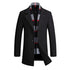 Men’s black wool overcoat with tailored fit and plaid scarf, modern streetwear style.