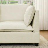 Modern cream corner lounge chair with soft fabric upholstery and boxy, relaxed fit