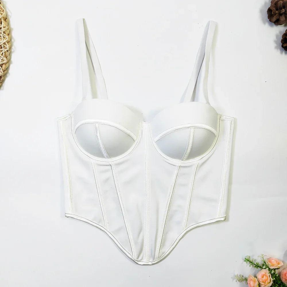 White structured corset top with underwire cups, thick straps, and fitted silhouette