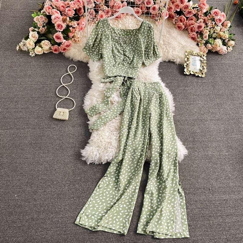 Light green polka dot two-piece set with short sleeve crop top and wide-leg pants, flowy fit