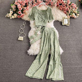 Light green polka dot two-piece set with short sleeve crop top and wide-leg pants, flowy fit