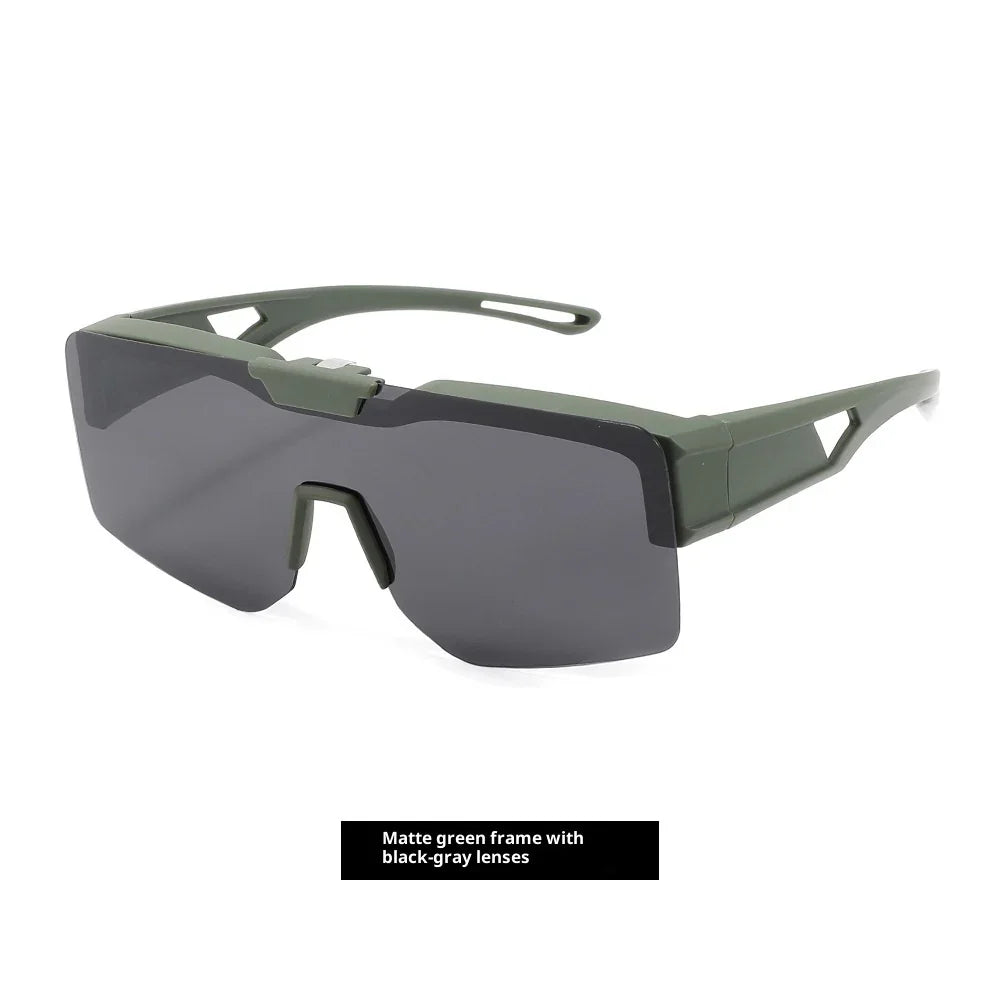 Futuristic matte green sunglasses with oversized black-gray lenses and angular frame design